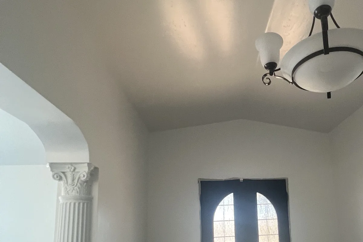Entry with a column, arched doorway and vaulted ceiling, a Tony's Painting job in San Diego County
