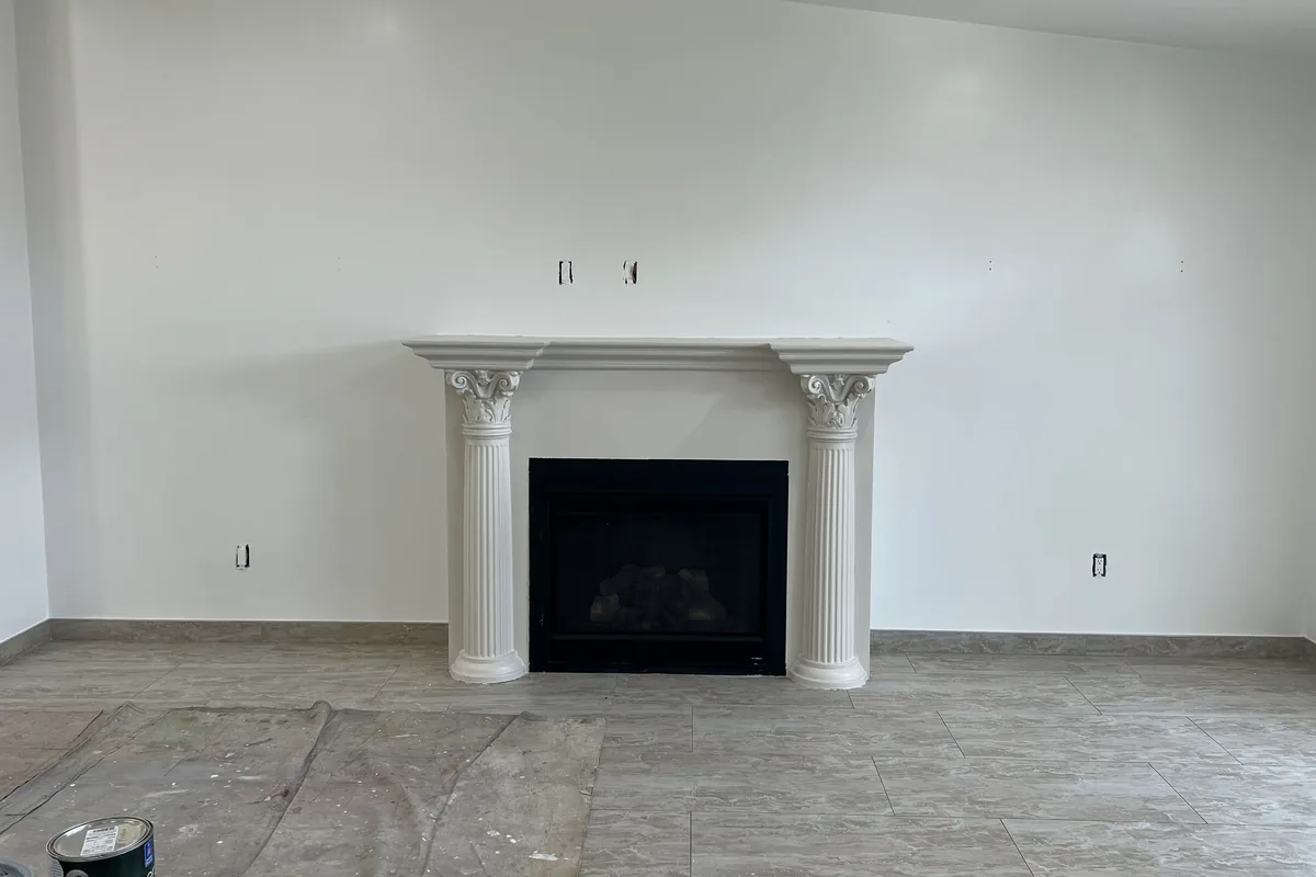 Living room and mantel wall after the repaint, a Tony's Painting job in San Diego County