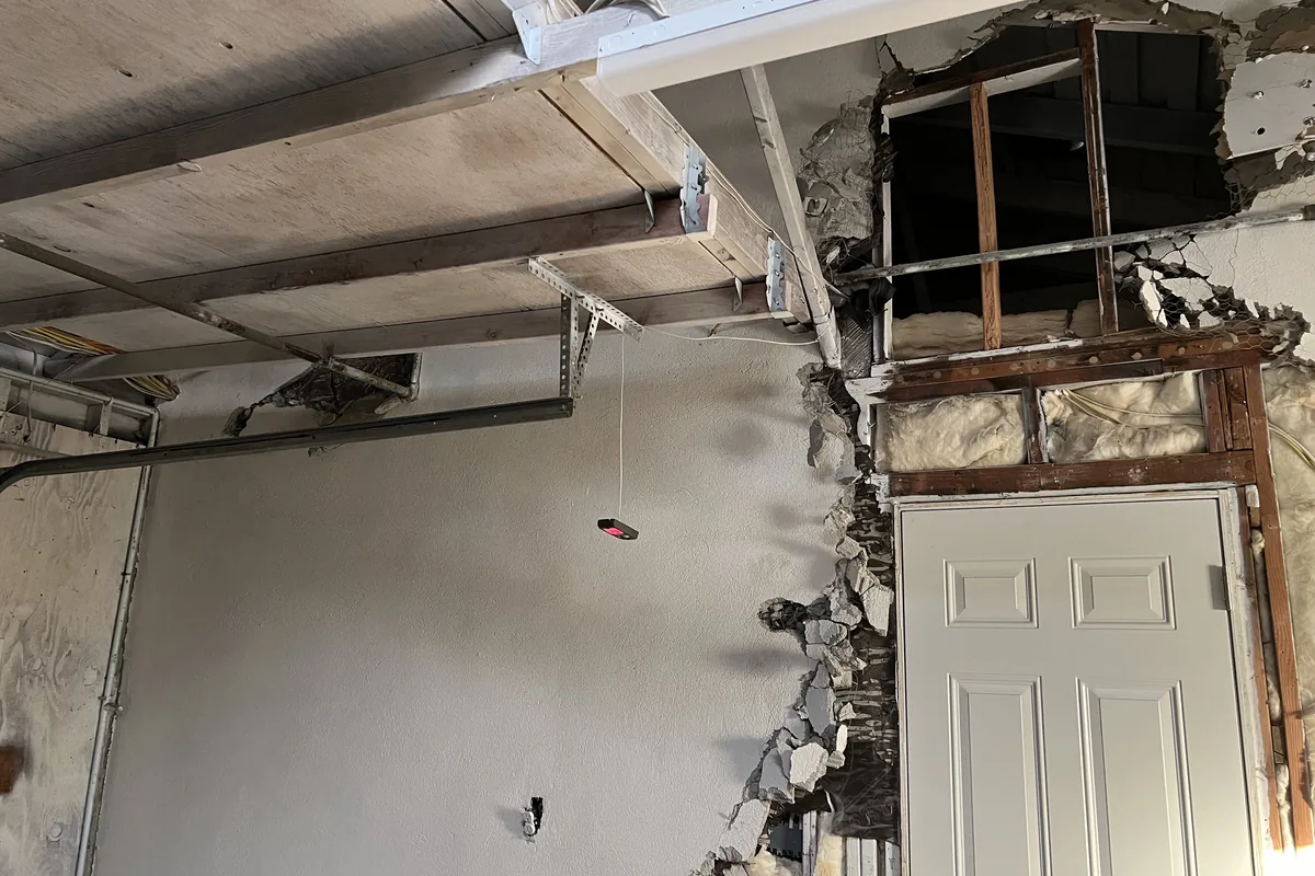 Failed board and trim cut back to sound framing, a Tony's Painting job in San Diego County