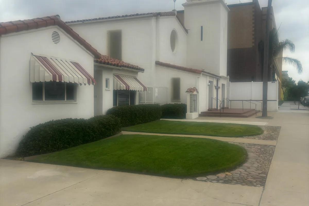 The church entrance and bell tower from the walkway, a Tony's Painting job in San Diego County