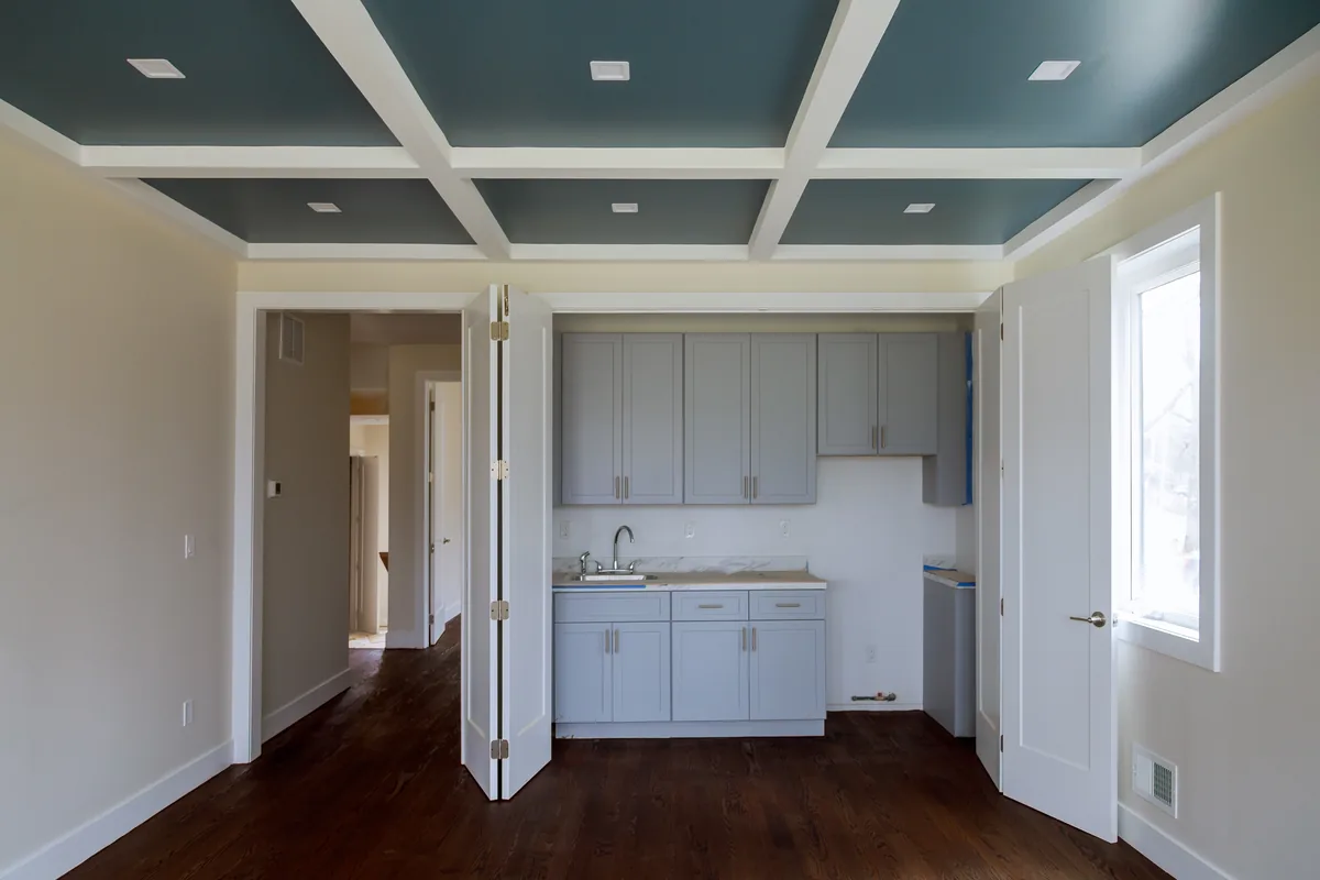 Vacant unit with freshly painted walls, ceiling and cabinets ready for turnover